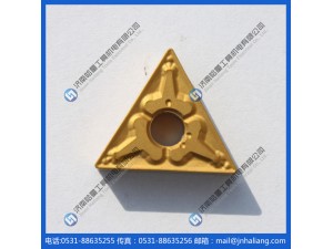 TM	半精切削、基本选择，具有宽范围排屑领域的断屑槽。刀尖旁独特形状的突起和大前角，使断屑槽保持锋利切削性能和低切削抗力。